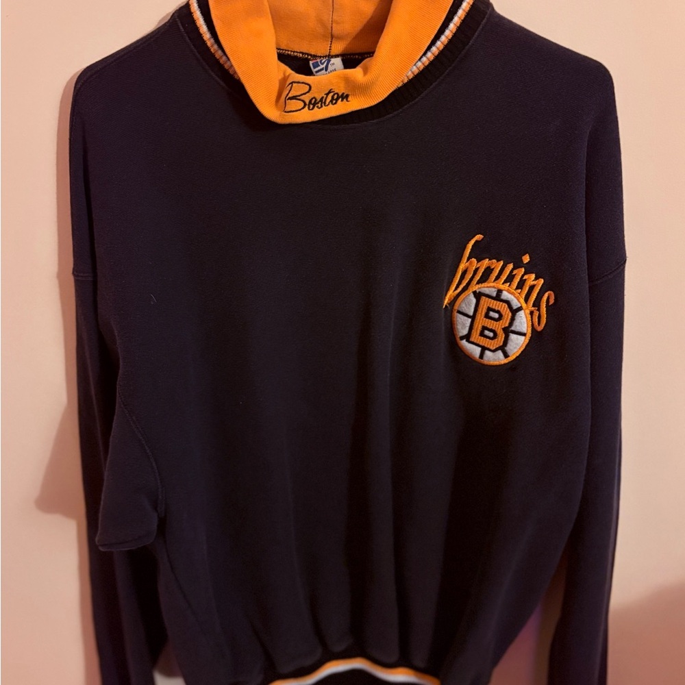 Vintage 1990s The Game Boston Bruins Turtle Neck Sweatshirt.